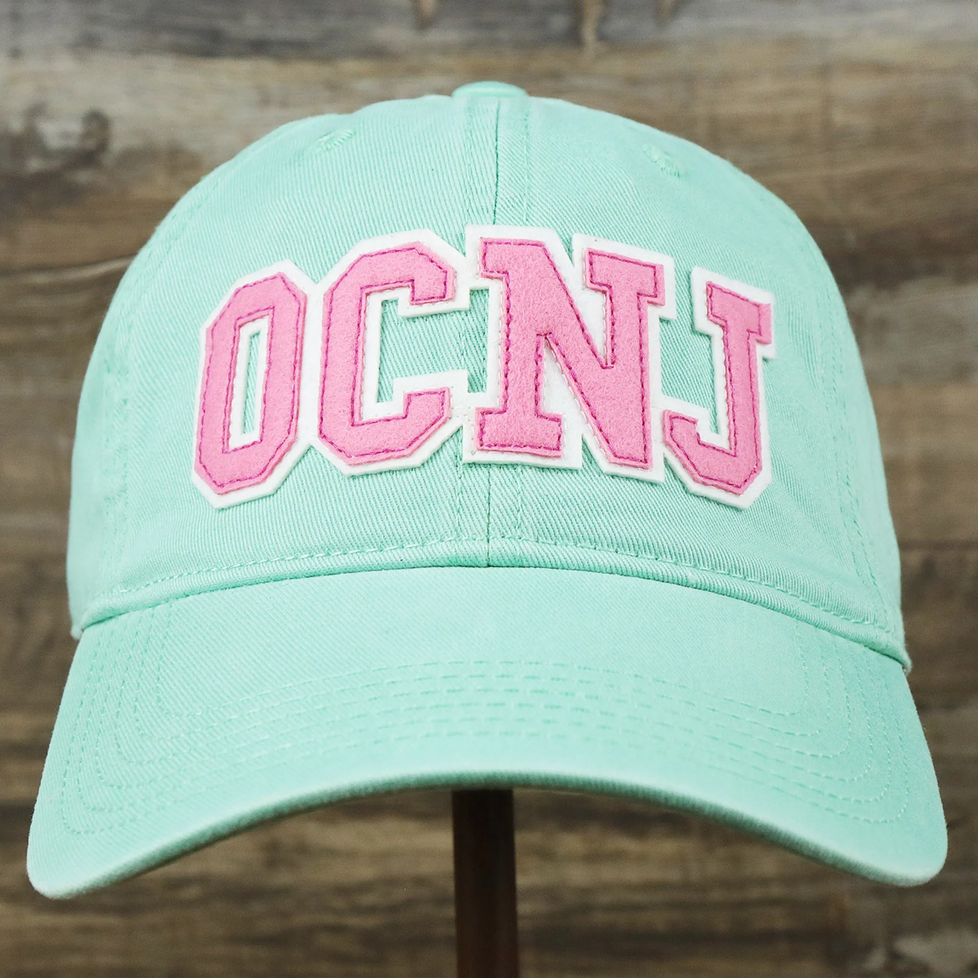 Pink OCNJ Wordmark White Outline Dad Hat | Spearmint Dad Hat