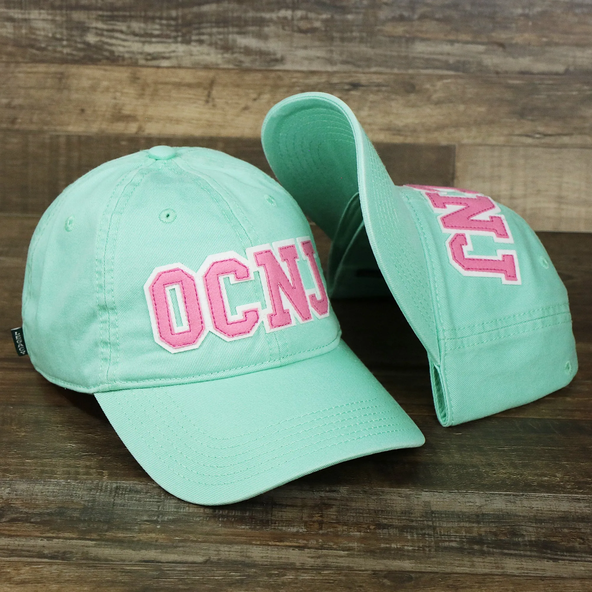 Pink OCNJ Wordmark White Outline Dad Hat | Spearmint Dad Hat