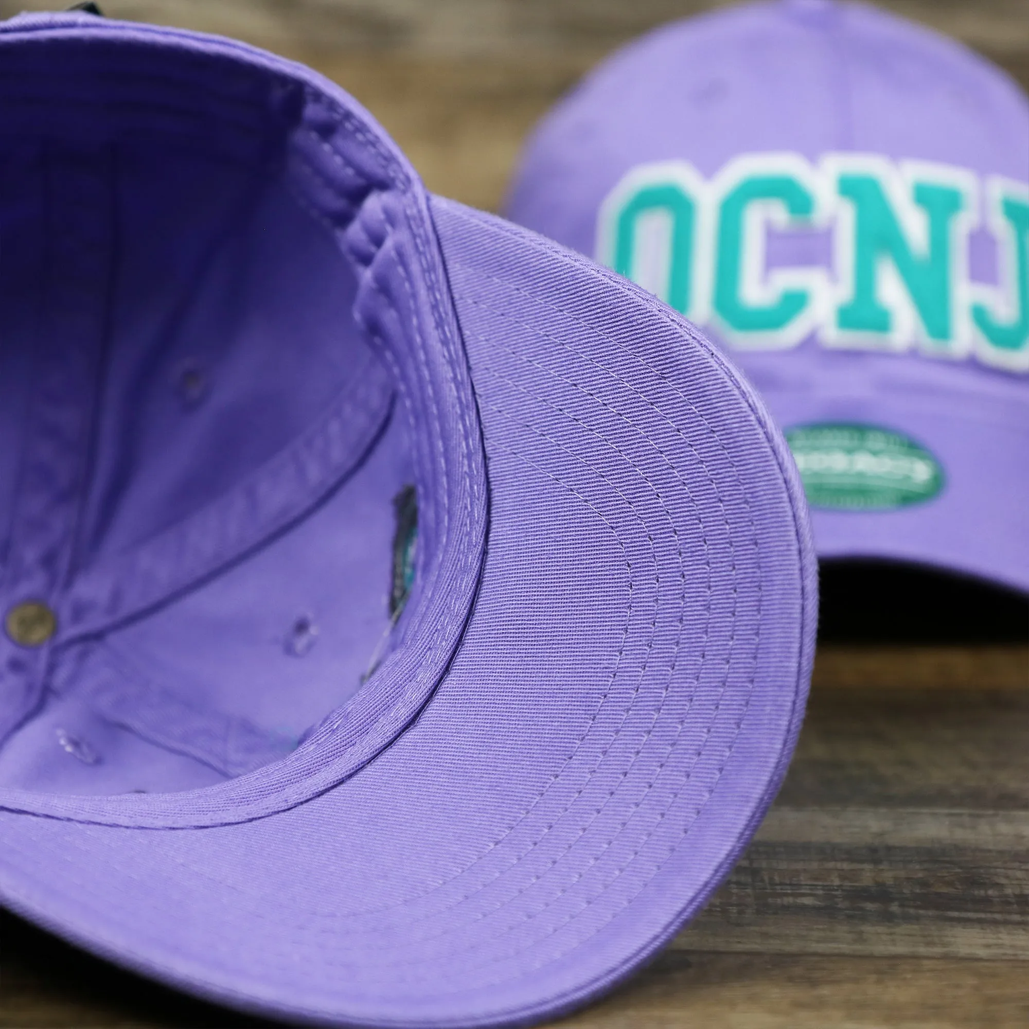 Teal OCNJ Wordmark White Outline Dad Hat | Lavender Dad Hat