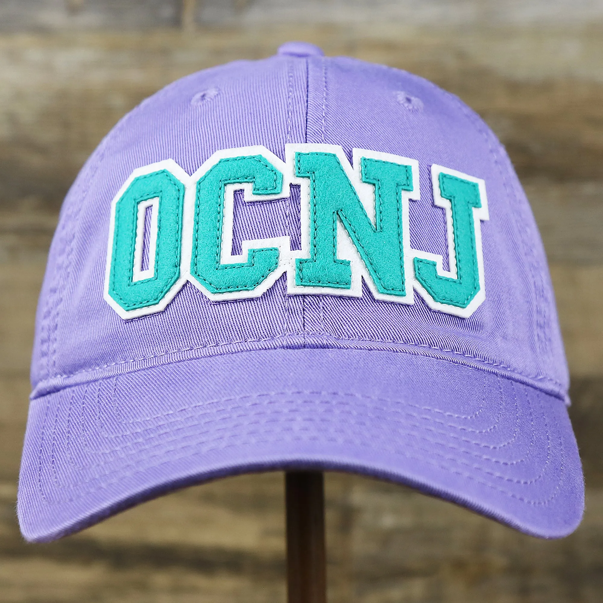 Teal OCNJ Wordmark White Outline Dad Hat | Lavender Dad Hat