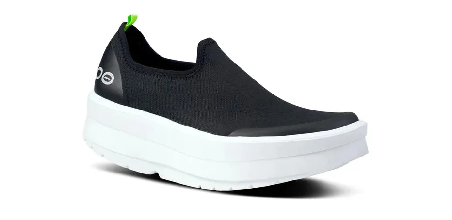  Women's OOMEGA eeZee Low Canvas Slip-On in Black/White  