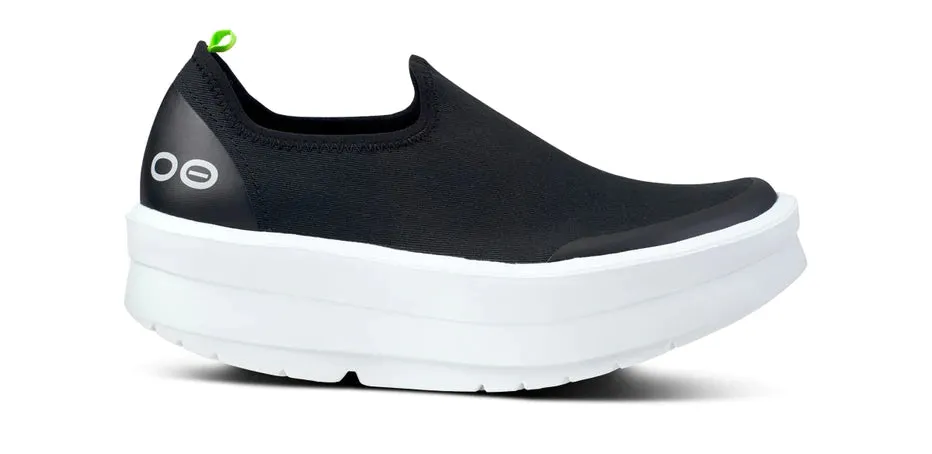  Women's OOMEGA eeZee Low Canvas Slip-On in Black/White  