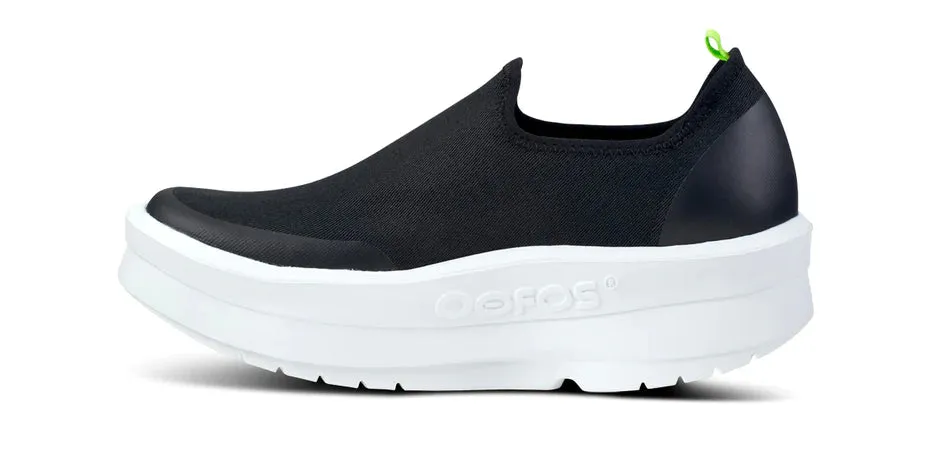  Women's OOMEGA eeZee Low Canvas Slip-On in Black/White  